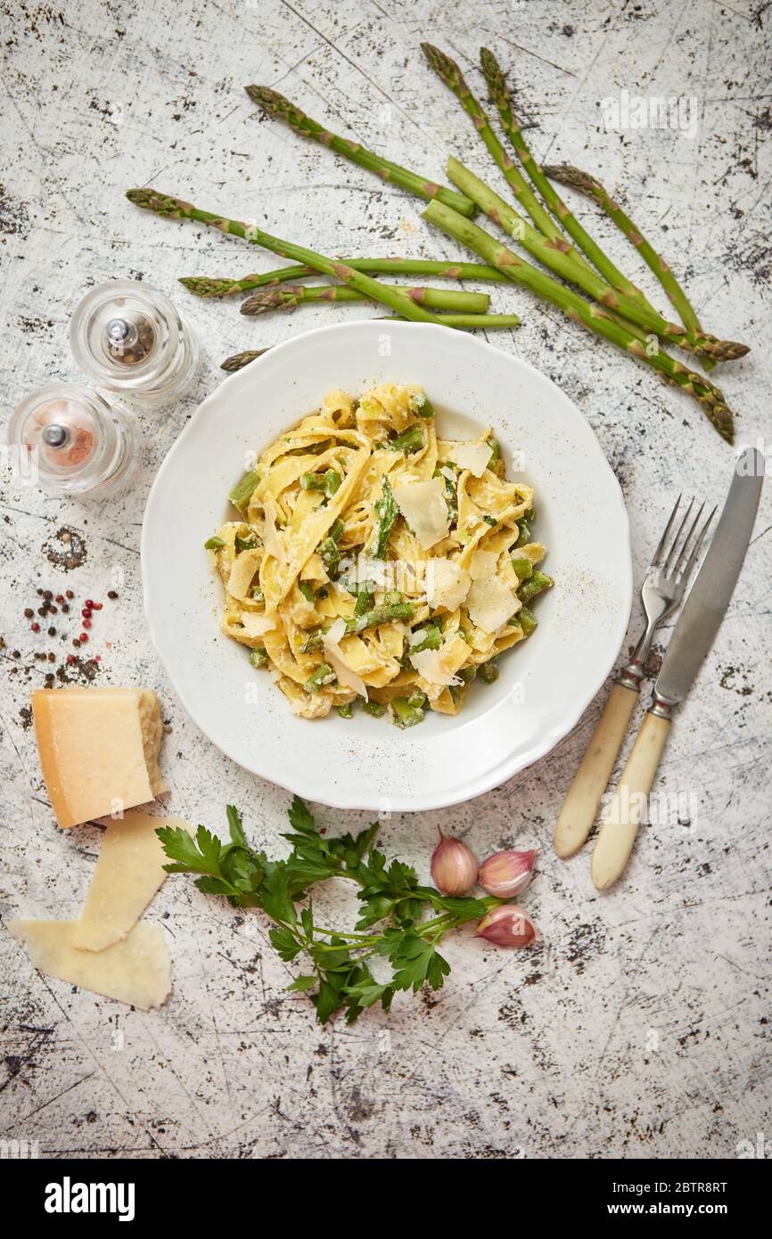 Homemade tagliatelle pasta with creamy ricotta cheese sauce and