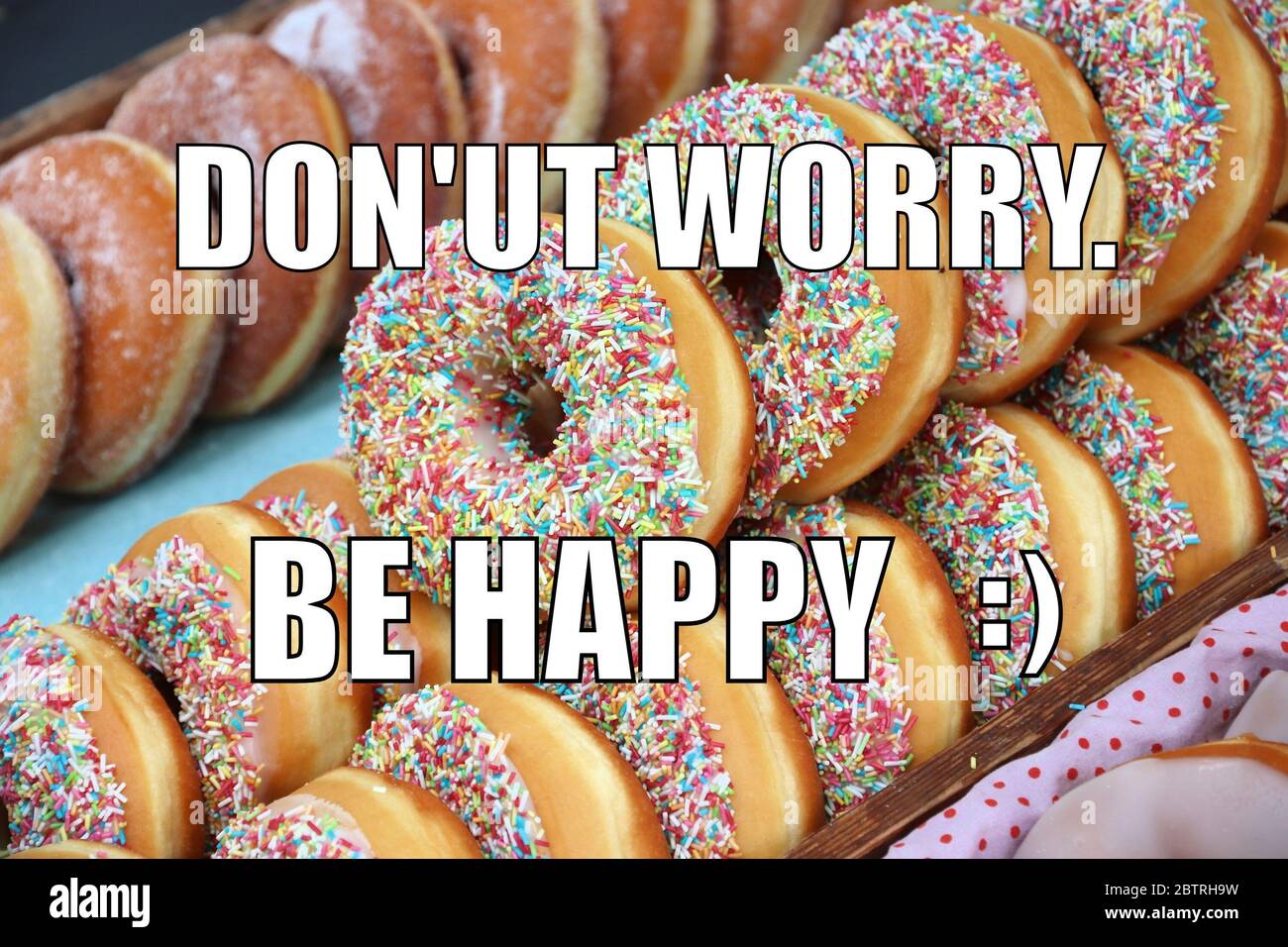 Funny meme for social media sharing. Donuts mean happiness. Stock Photo