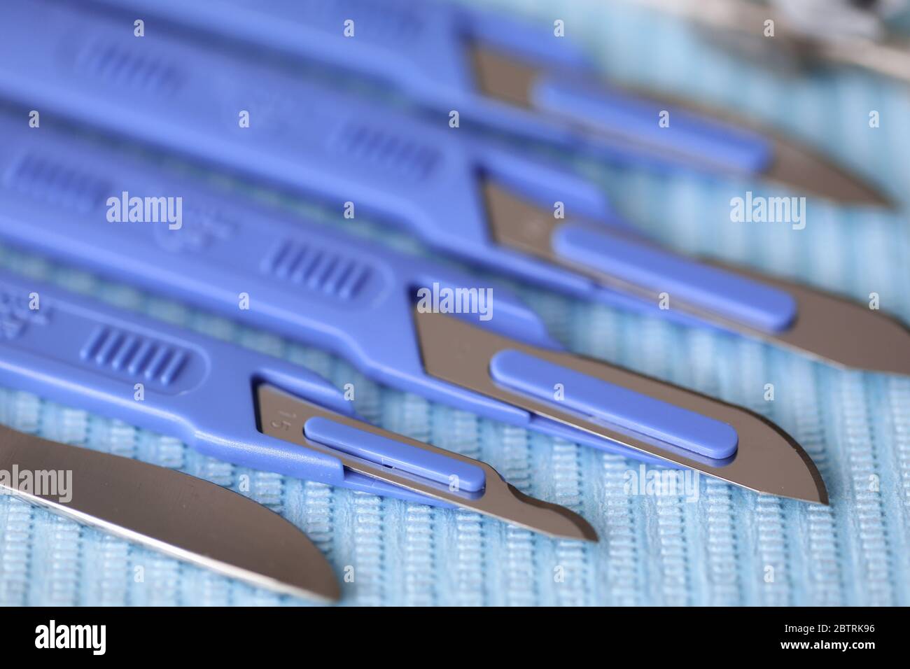 Closeup on table are medical tools scalpels Stock Photo Alamy