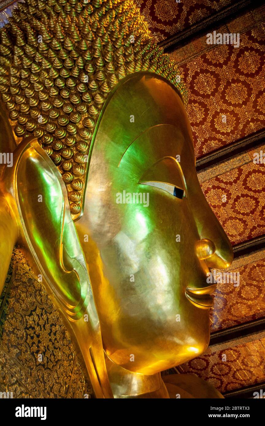 The head of the Reclining Golden Buddha in Wat Pho temple (Wat Phra Chetuphon), Bangkok, Thailand, Southeast Asia, Stock Photo