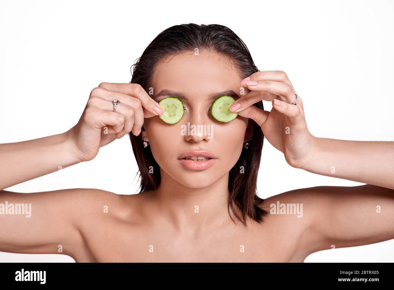 Concept Face care at home. Portrait of young beautiful woman with