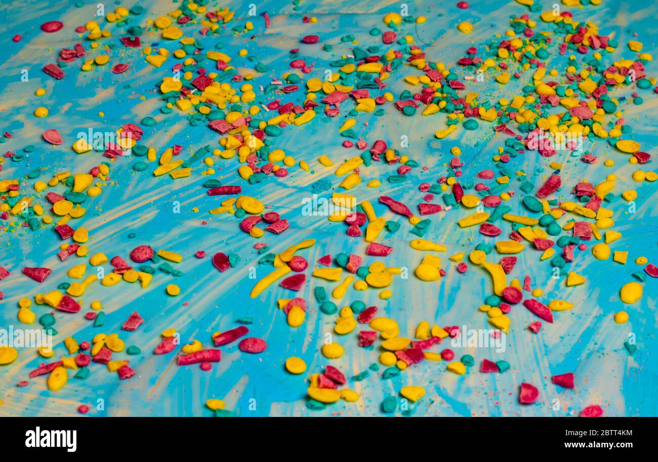 colored shavings on a blue background Stock Photo