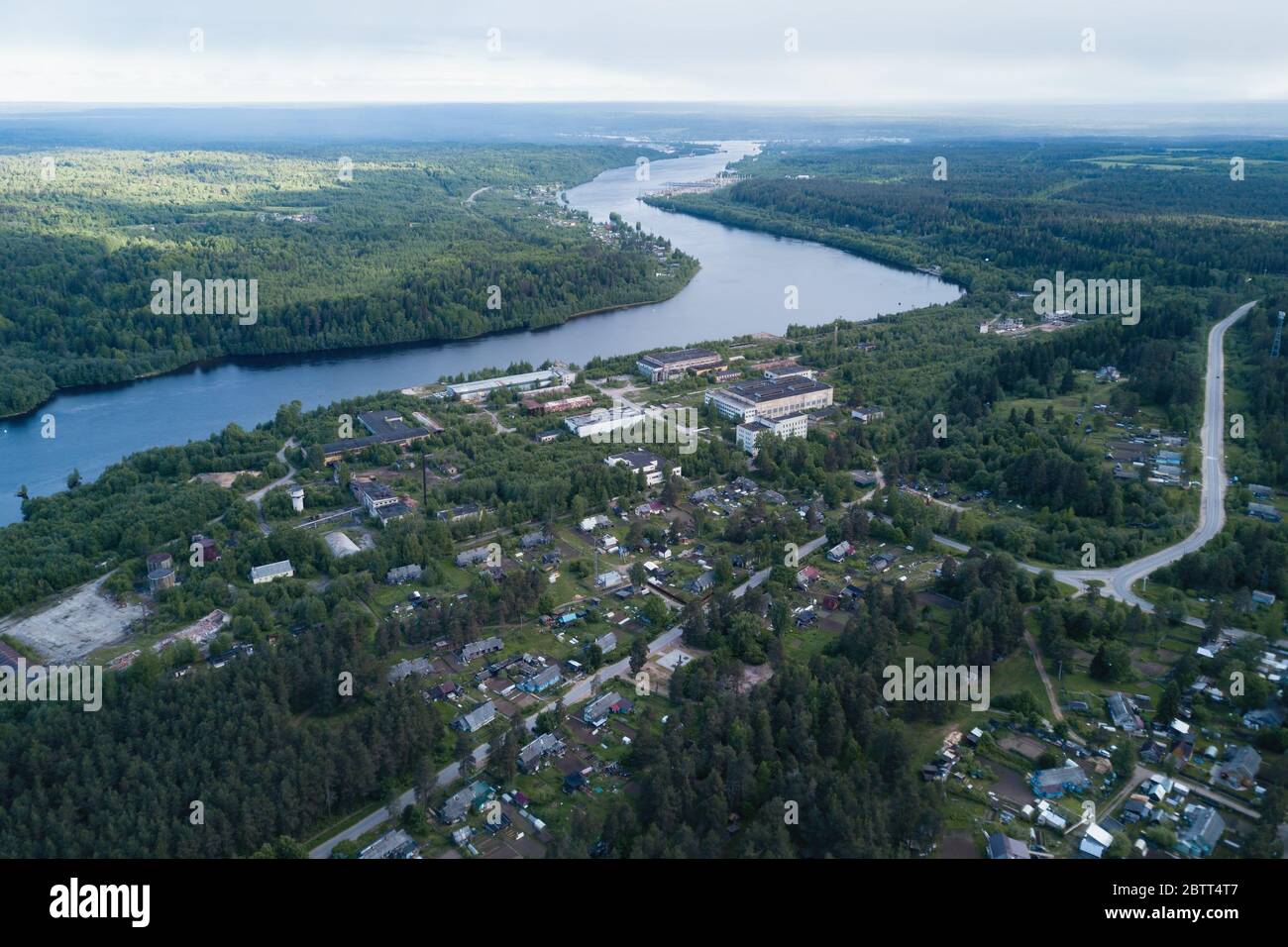 Aerial view of the Svir river and houses in urban-type settlement in Leningrad region, Russia. Stock Photo