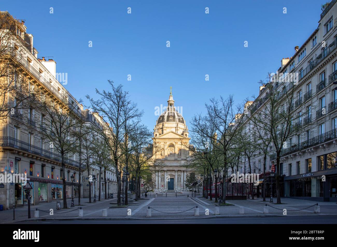 Paris, France - March 30, 2020: 14th day of containment because of Covid-19 in front of Sorbonne university in Paris. Nobody in the street Stock Photo