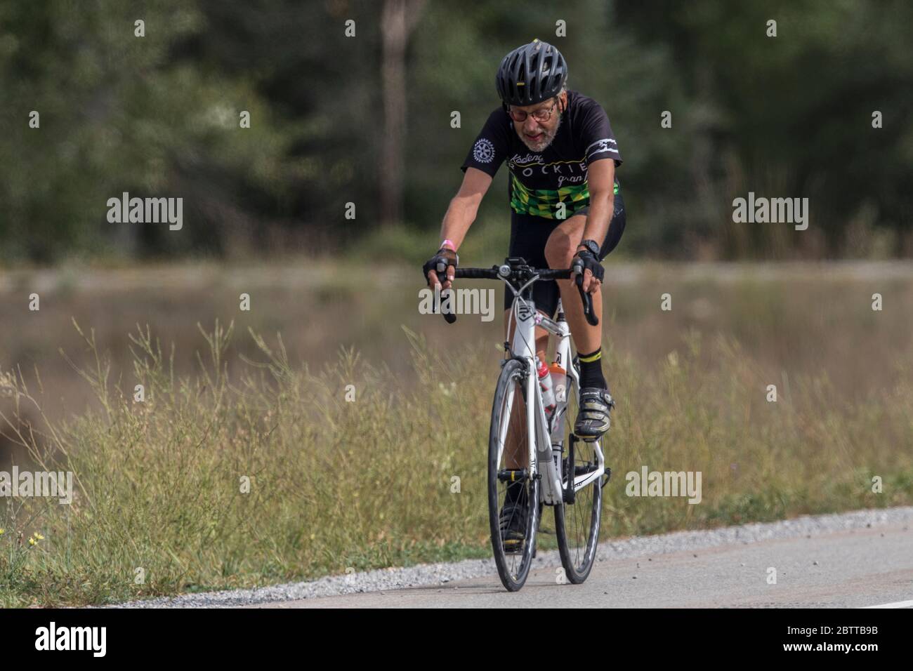Single Rider Bicycle Scenic Bike Race, single rider, in full racing gear and uniform Stock ...