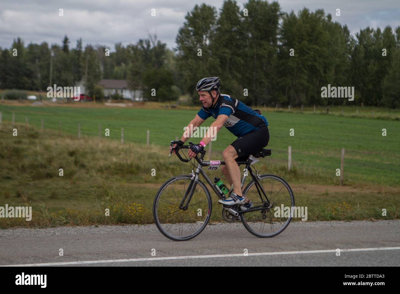 Single Rider Bicycle Scenic Bike Race, single rider, in full racing gear and uniform Stock ...