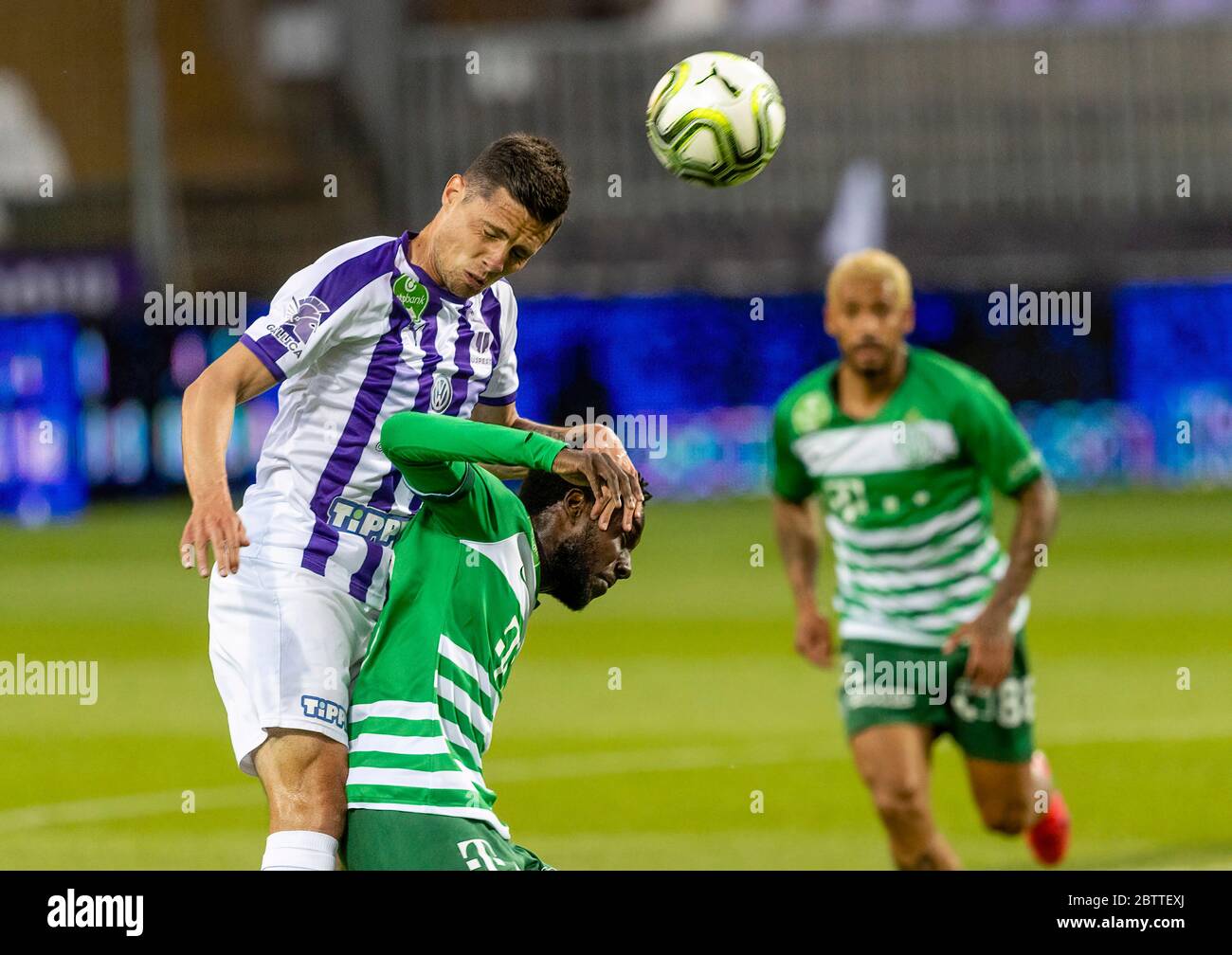 BUDAPEST, HUNGARY - AUGUST 13: (l-r) Tokmac Chol Nguen of Ferencvarosi TC  wins the ball from Arijan Ademi of GNK Dinamo Zagreb during the UEFA  Champions League Third Qualifying Round match between