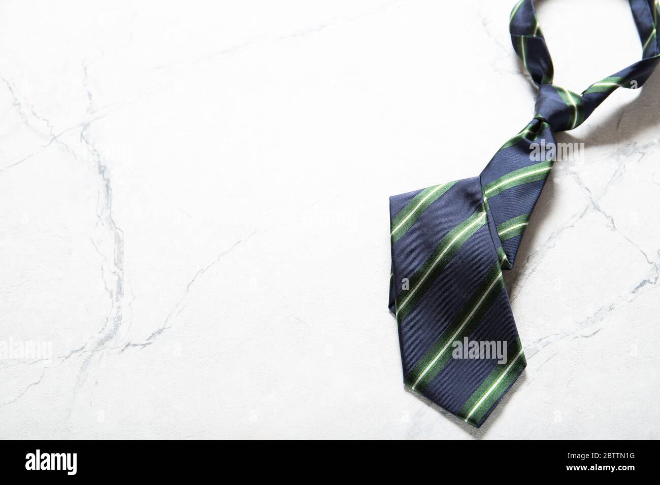 Men's handsome tie, top view. Place for text. Daddy's day concept. Stock Photo