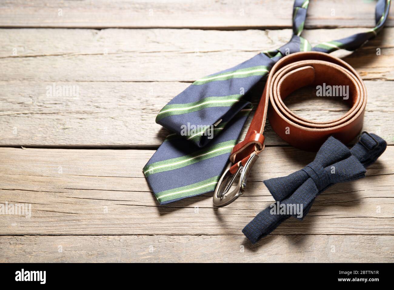 Men's accessories on a wooden background. Place for text. Daddy's Day Holiday Concept Stock Photo