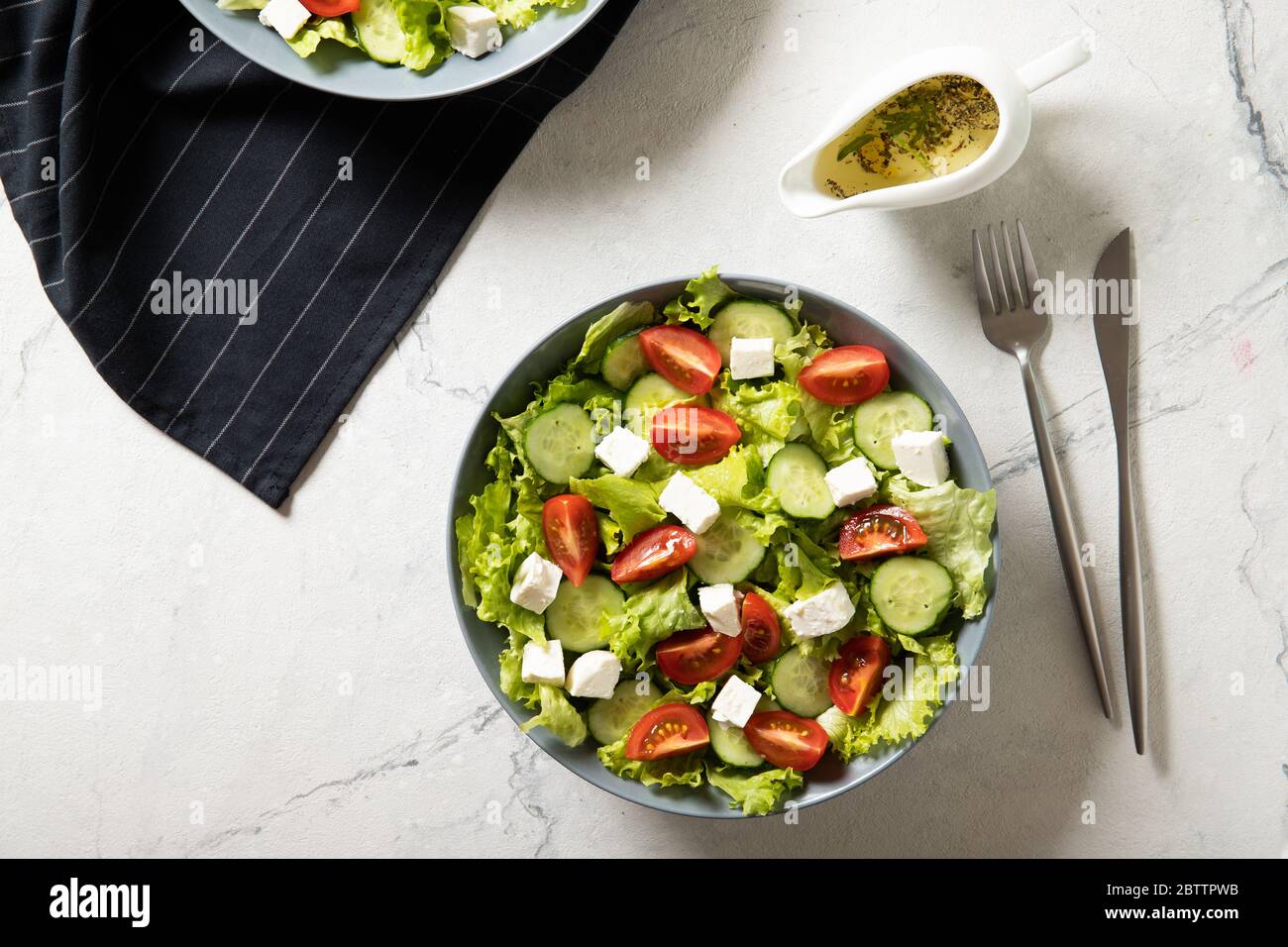 Delicious salad of fresh vegetables and feta. View from above Stock Photo