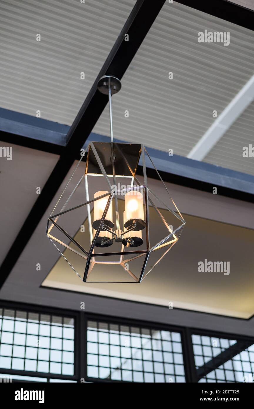 Modern black wire frame ceiling lamp interior lighting bulbs vintage style decoration contemporary. Stock Photo
