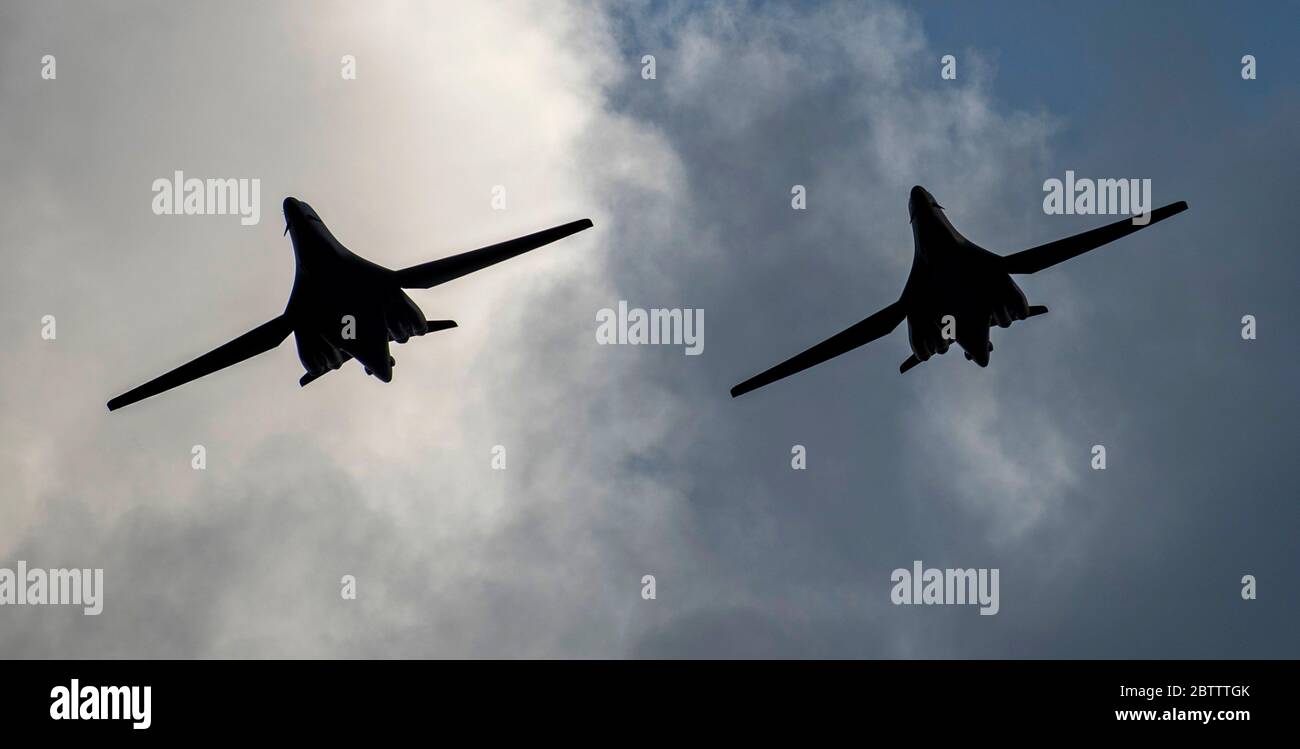 Two U.S. Air Force B-1B Lancer stealth bomber aircraft from the 9th Expeditionary Bomb Squadron, fly in formation during a large force exercise May 22, 2020 at Andersen Air Force Base, Guam. Stock Photo