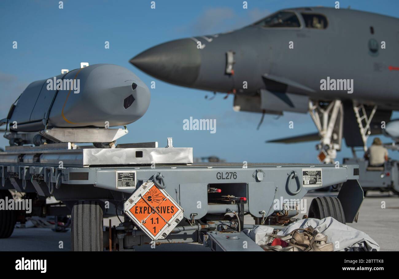 A U.S. Air Force joint air-to-surface standoff cruise missile is ready to be loaded onboard a B-1B Lancer stealth bomber aircraft from the 9th Expeditionary Bomb Squadron, on the flight line at Andersen Air Force Base May 8, 2020 in Yigo, Guam. Stock Photo