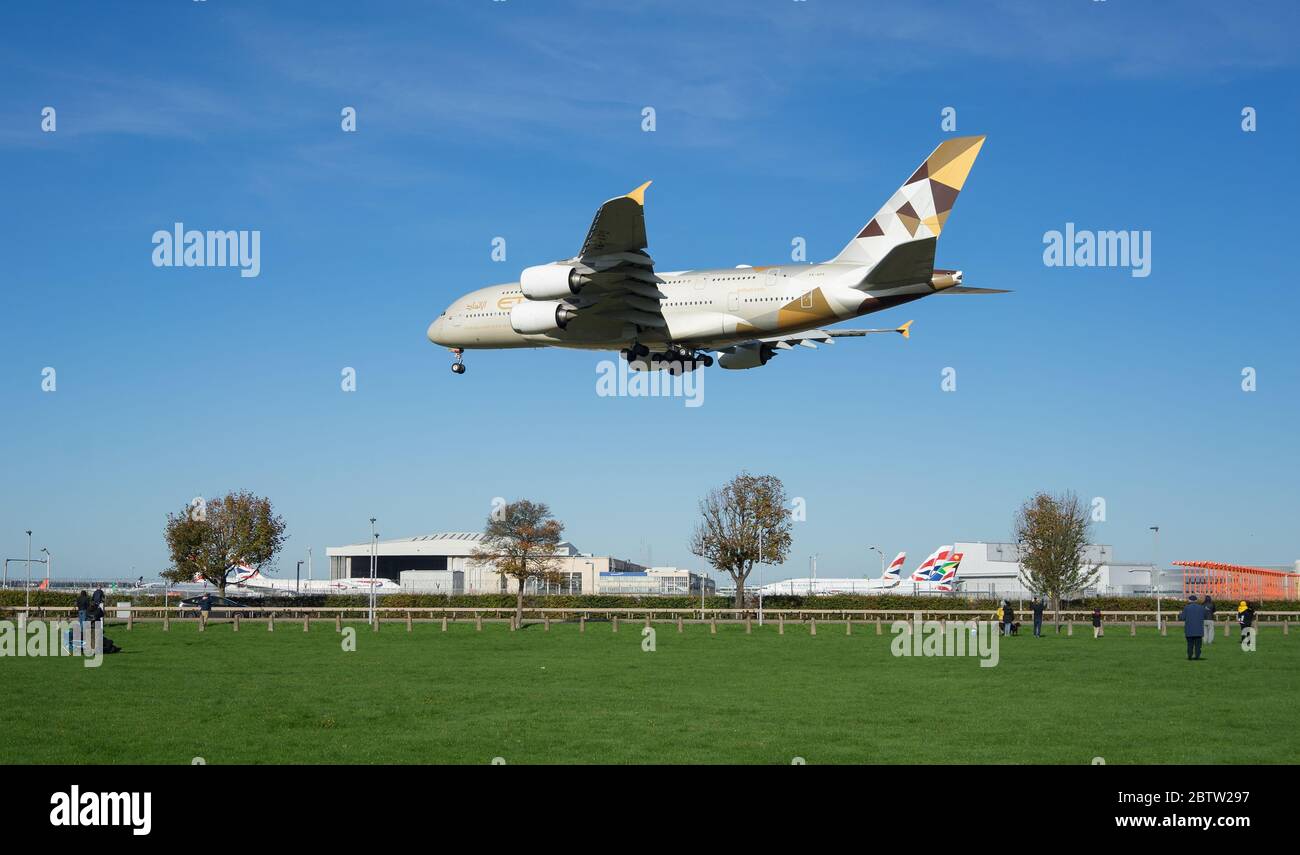 Etihad Airways Airbus A380 landing at Heathrow Airport on a sunny day