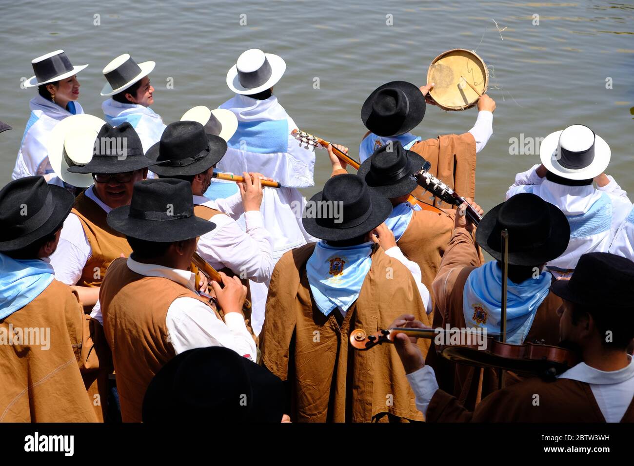 Peru Huacachina - Vendimia Festival folk music group plays in the oasis Stock Photo