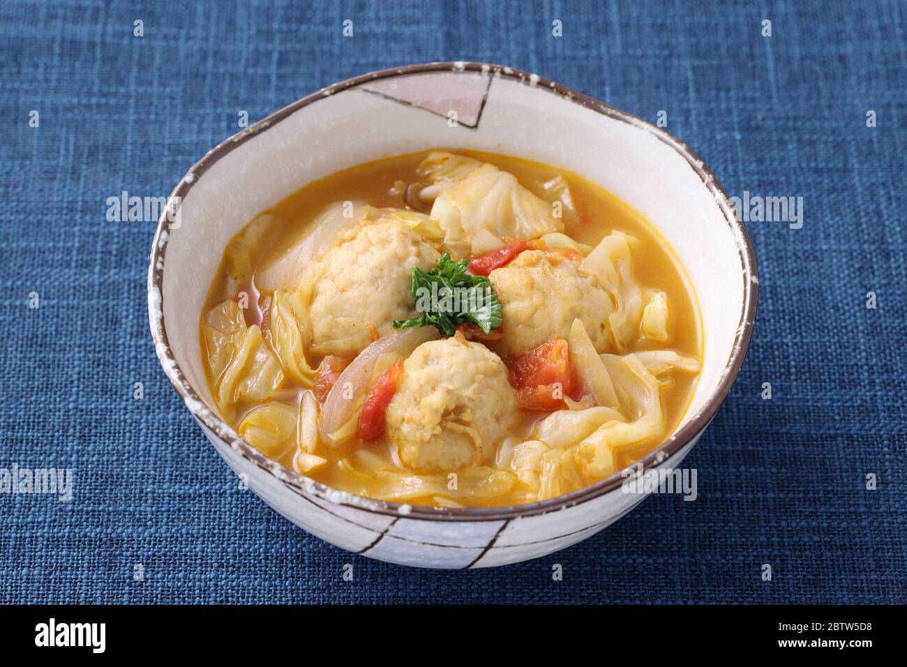 meat ball with vegetable soup in a dish on table Stock Photo