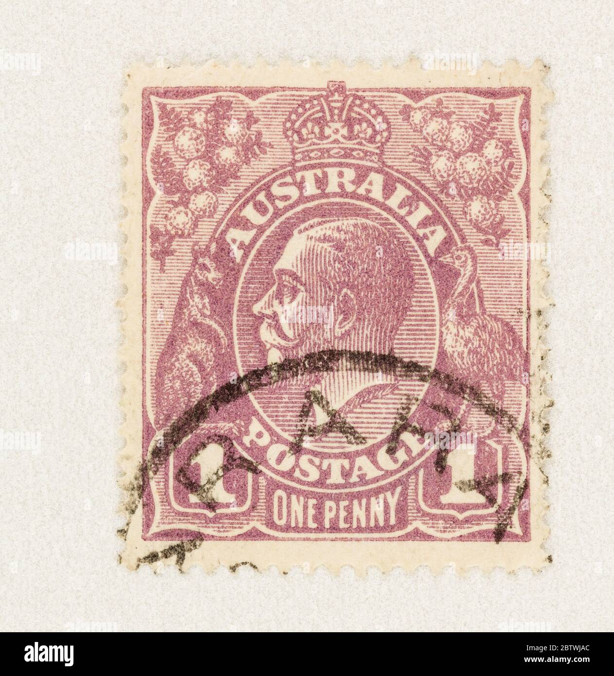 SEATTLE WASHINGTON - May 27, 2020:  King George V with emu and kangaroo in dull red on 1 penny Australian stamp. Stock Photo