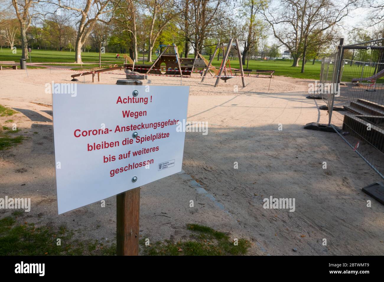 Attention due to the risk of corona infection, the playgrounds will remain closed until further notice Stock Photo