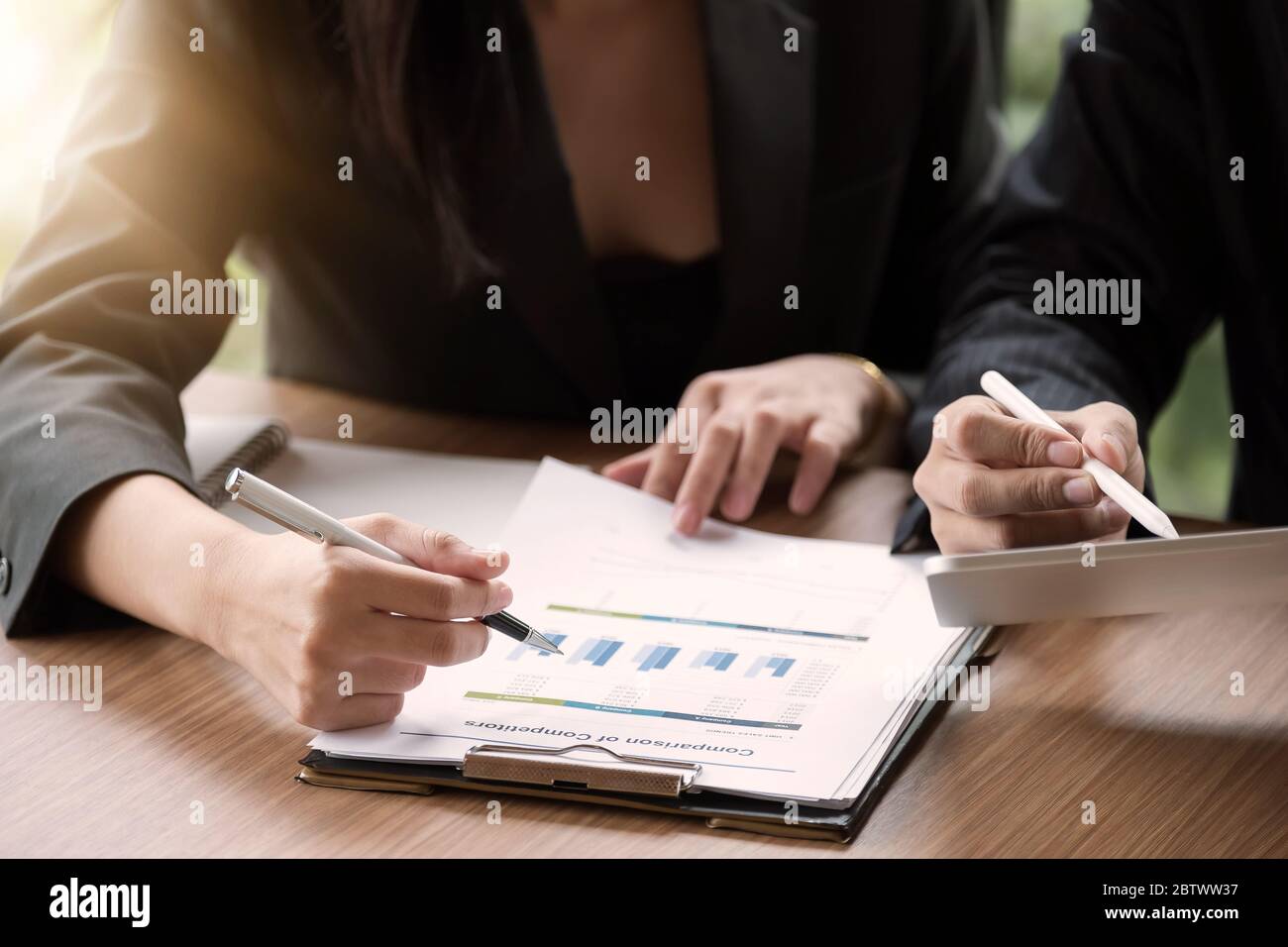 Close up Group of business people busy discussing financial matter during meeting. Corporate Organization Meeting Concept Stock Photo