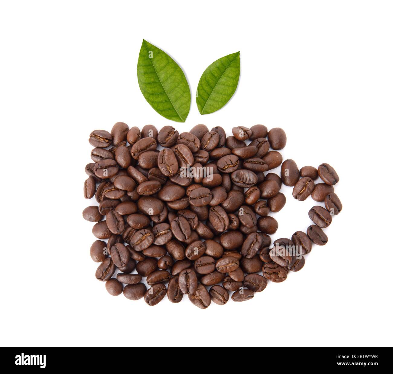 Roasted coffee beans with coffee leaves in the shape of a cup studio ...