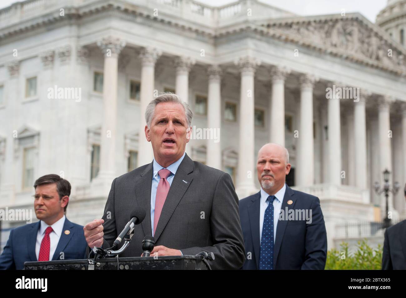 House Minority Leader Rep. Kevin McCarthy (R-Calif.) holds a media availability with House Minority Whip Rep. Steve Scalise (R-LA), House GOP Conference Chairwoman Liz Cheney (R-WY) and others, to announce that Republican leaders have filed a lawsuit against House Speaker Nancy Pelosi and congressional officials in an effort to block the House of Representatives from using a proxy voting system to allow for remote voting during the coronavirus pandemic, outside of the U.S. Capitol in Washington, DC., Wednesday, May 27, 2020. Credit: Rod Lamkey/CNP | usage worldwide Stock Photo