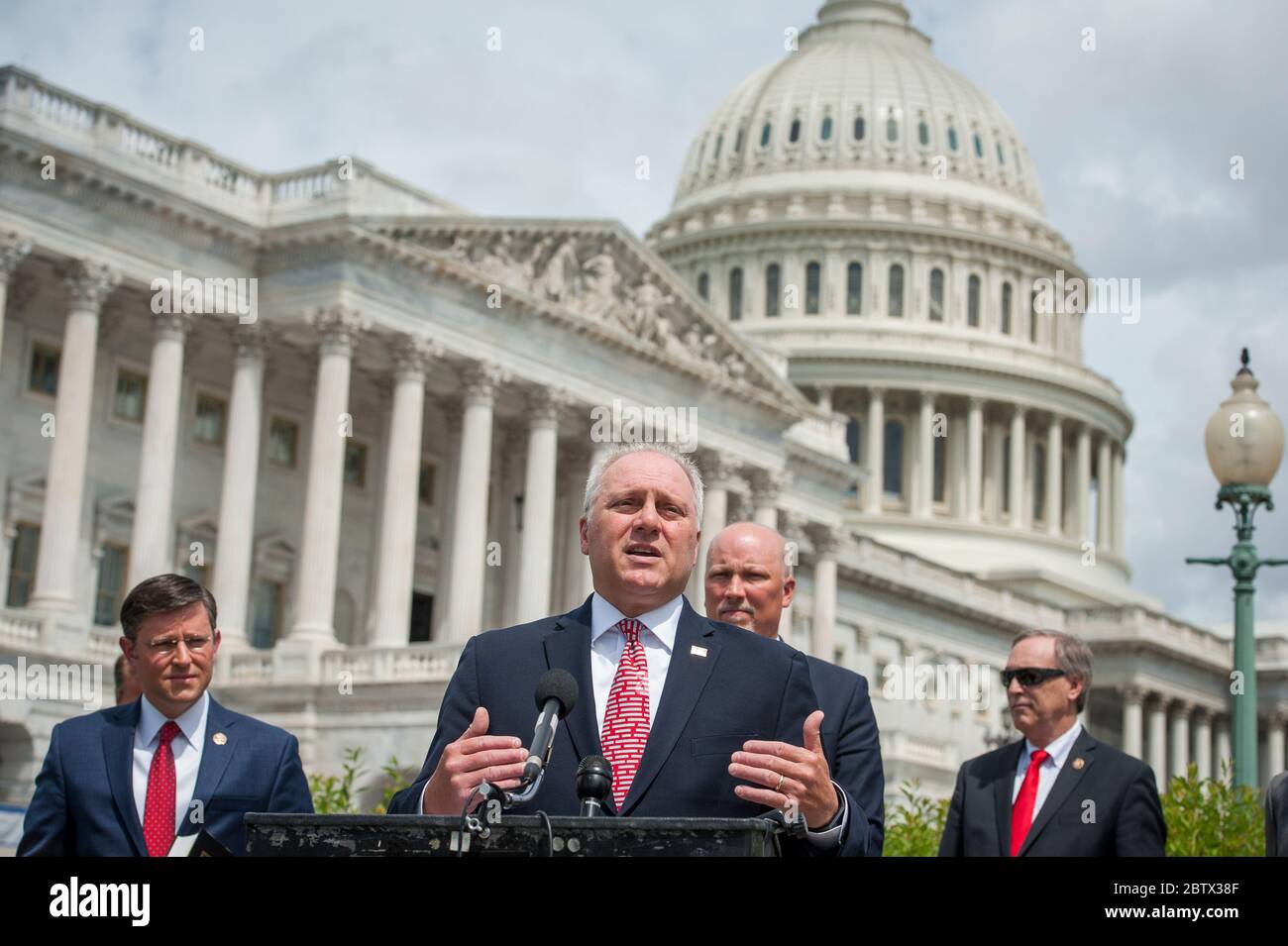 House Minority Whip Rep. Steve Scalise (R-LA) offers remarks as he is joined by House Minority Leader Rep. Kevin McCarthy (R-Calif., left), House GOP Conference Chairwoman Liz Cheney (R-WY) and others, to announce that Republican leaders have filed a lawsuit against House Speaker Nancy Pelosi and congressional officials in an effort to block the House of Representatives from using a proxy voting system to allow for remote voting during the coronavirus pandemic, outside of the U.S. Capitol in Washington, DC., Wednesday, May 27, 2020. Credit: Rod Lamkey/CNP | usage worldwide Stock Photo