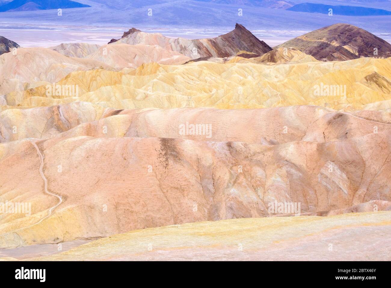 A trail leading up and through Zabriski Point in Death Valley National Park Stock Photo