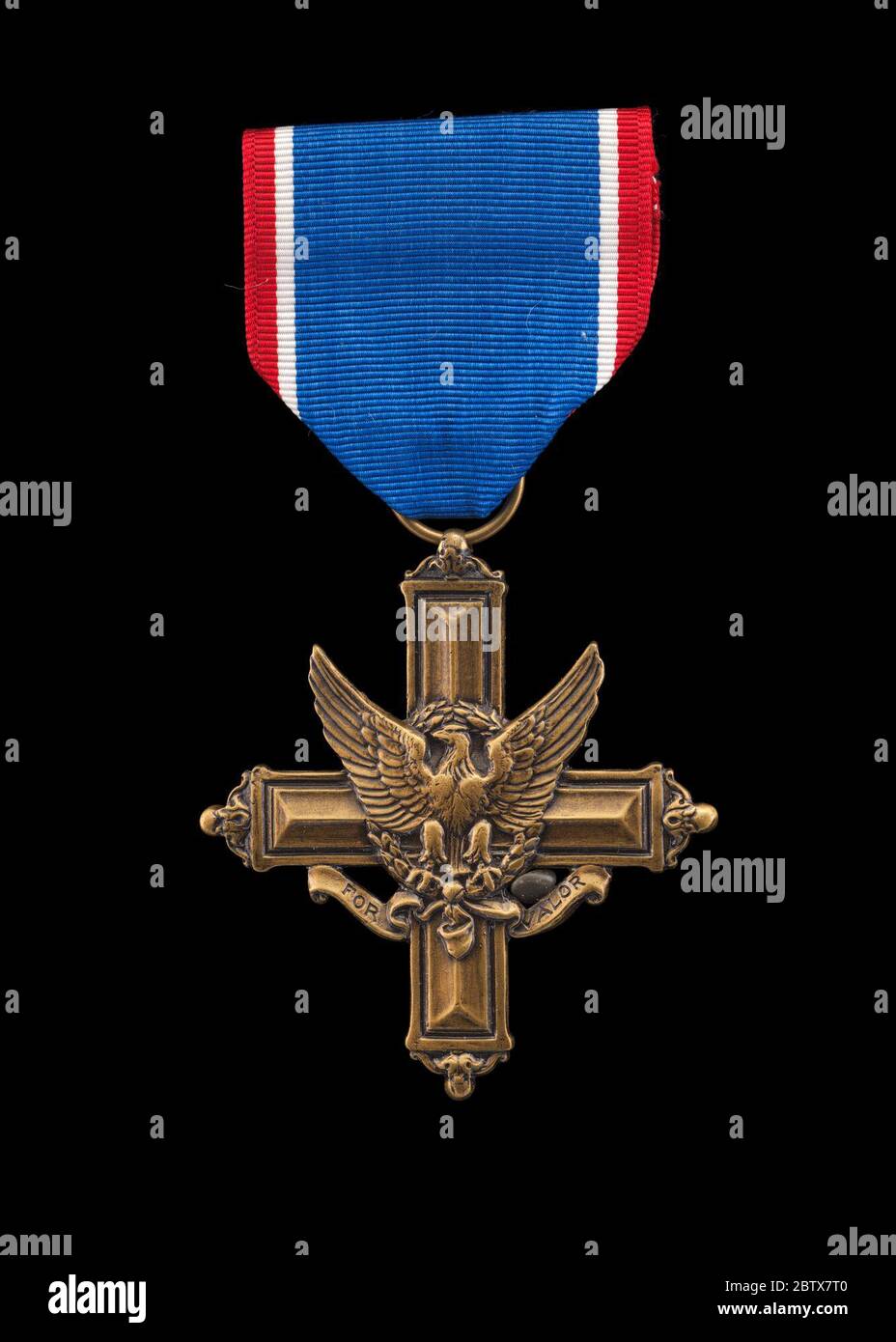 Distinguished Service Cross and ribbon issued to Lewis Broadus. Lewiston Cunningham Broadus (1875-1960) was veteran of the United States Army, who served his country with valor for over 32 years, from 1897 to 1923. Stock Photo
