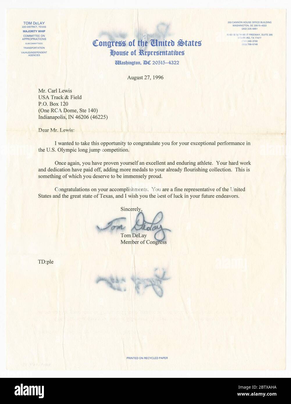 Letter from US Representative Tom DeLay to Carl Lewis. Typed letter from Tom DeLay., Texas Congressman, to Carl Lewis, with DeLay's signature. Dated August 27, 1996. Blue U.S. House of Representatives letterhead at the top. The letter reads [August 27, 1996 / Mr. Carl Lewis / USA Track & Field / P.O. Box 120 / (One RCA Dome, Ste. Stock Photo