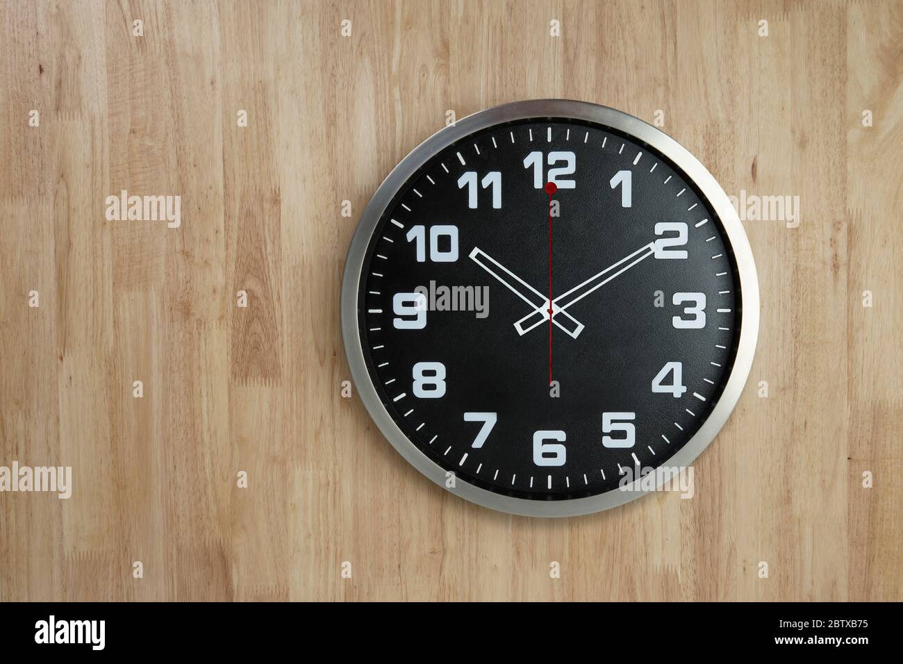 Standless Clock on Wooden Background Stock Photo