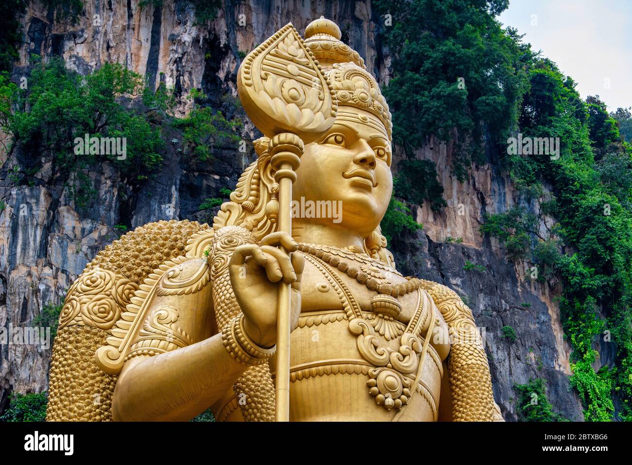 Statue of Lord Muragan and entrance at Batu Caves in Kuala Lumpur, Malaysia. Stock Photo