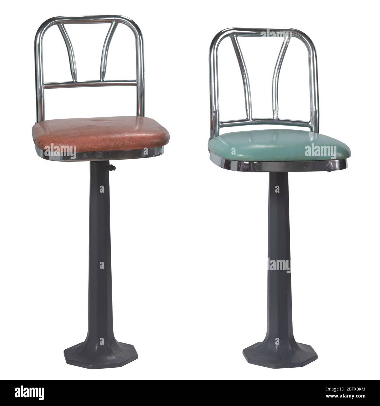 Lunch counter stool from Greensboro North Carolina sitins. A green lunch counter stool from the F. W. Woolworth department store in Greensboro, North Carolina. The back rest and frame of the seat are chrome plated metal. Stock Photo