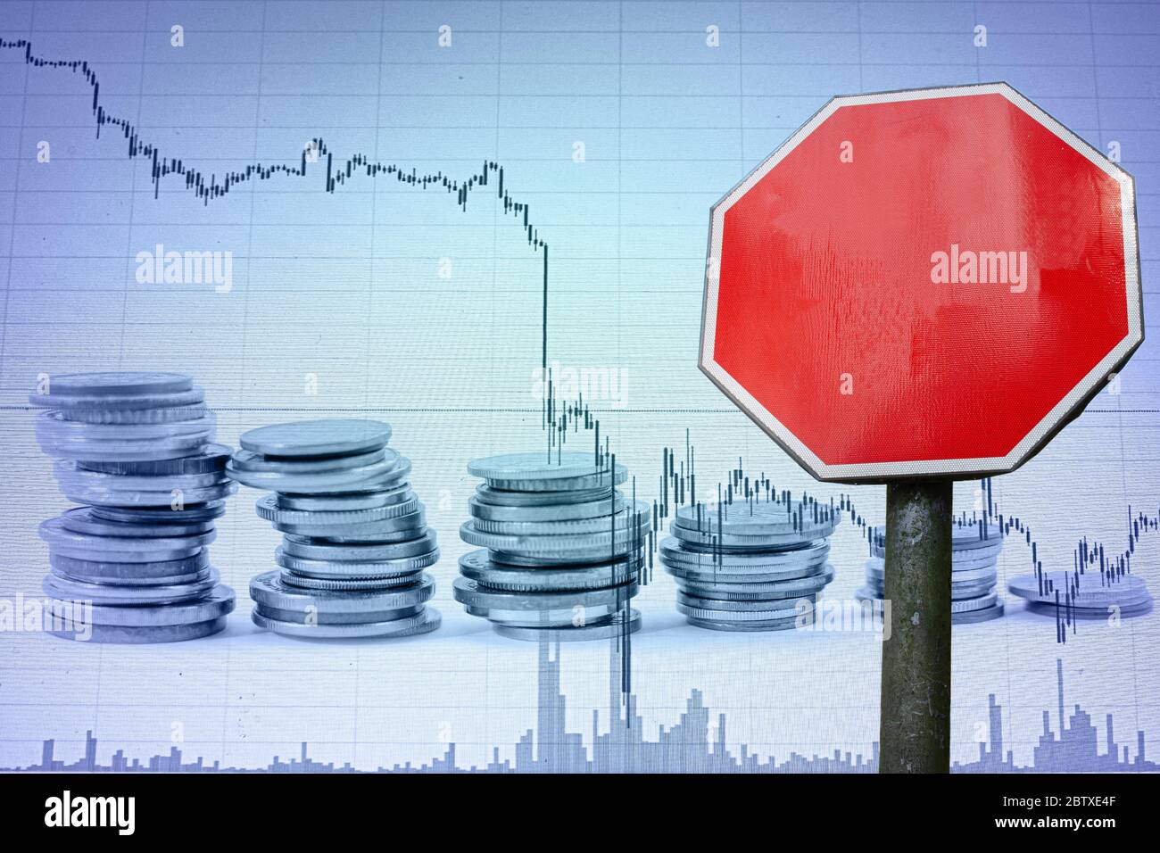 Stop sign with copy space on economy background. Business and finance concept. Template for money, economy concept. Stock Photo