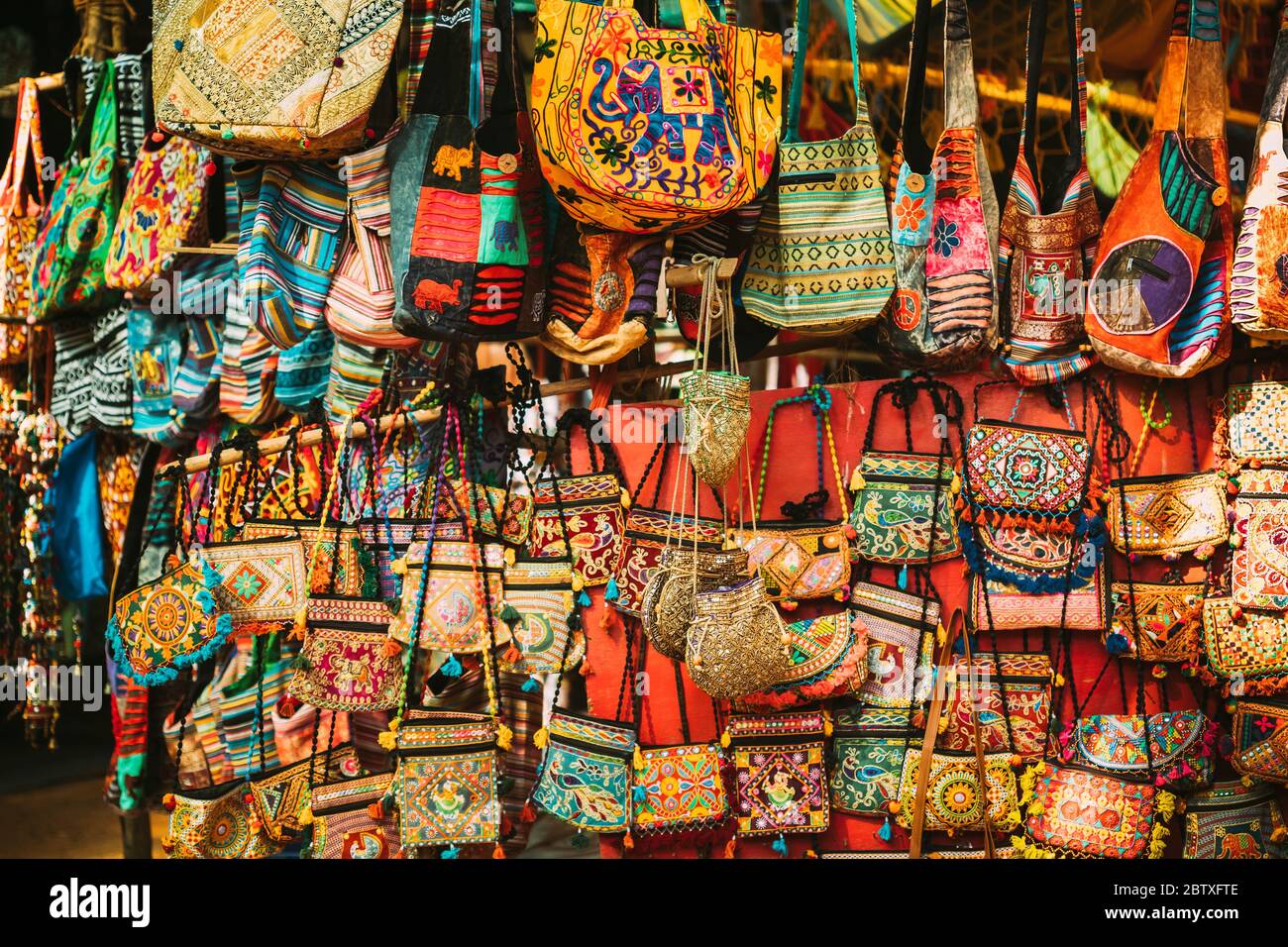 Goa, India. Traditional Store Market With Hand-sewn Bags Different Colors  And Sizes. Popular Souvenirs From India Stock Photo - Alamy