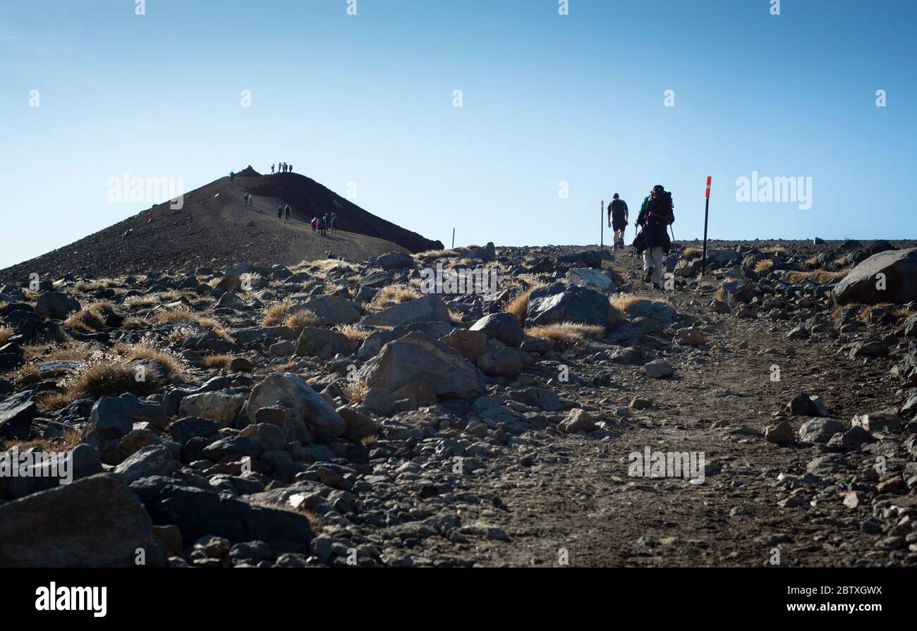Tourists climbing up the Red Crater on the Tongariro Alpine Crossing Stock Photo