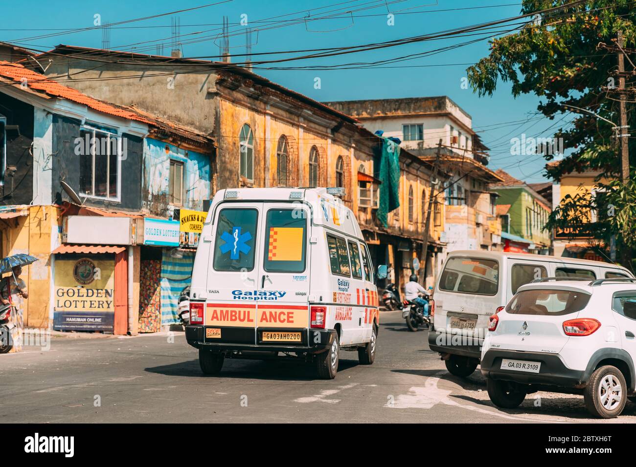 Mapusa, Goa, India - February 19, 2020: Ambulance Car Moving With Siren Emergency Ambulance Reanimation Van Car On Street. Stock Photo