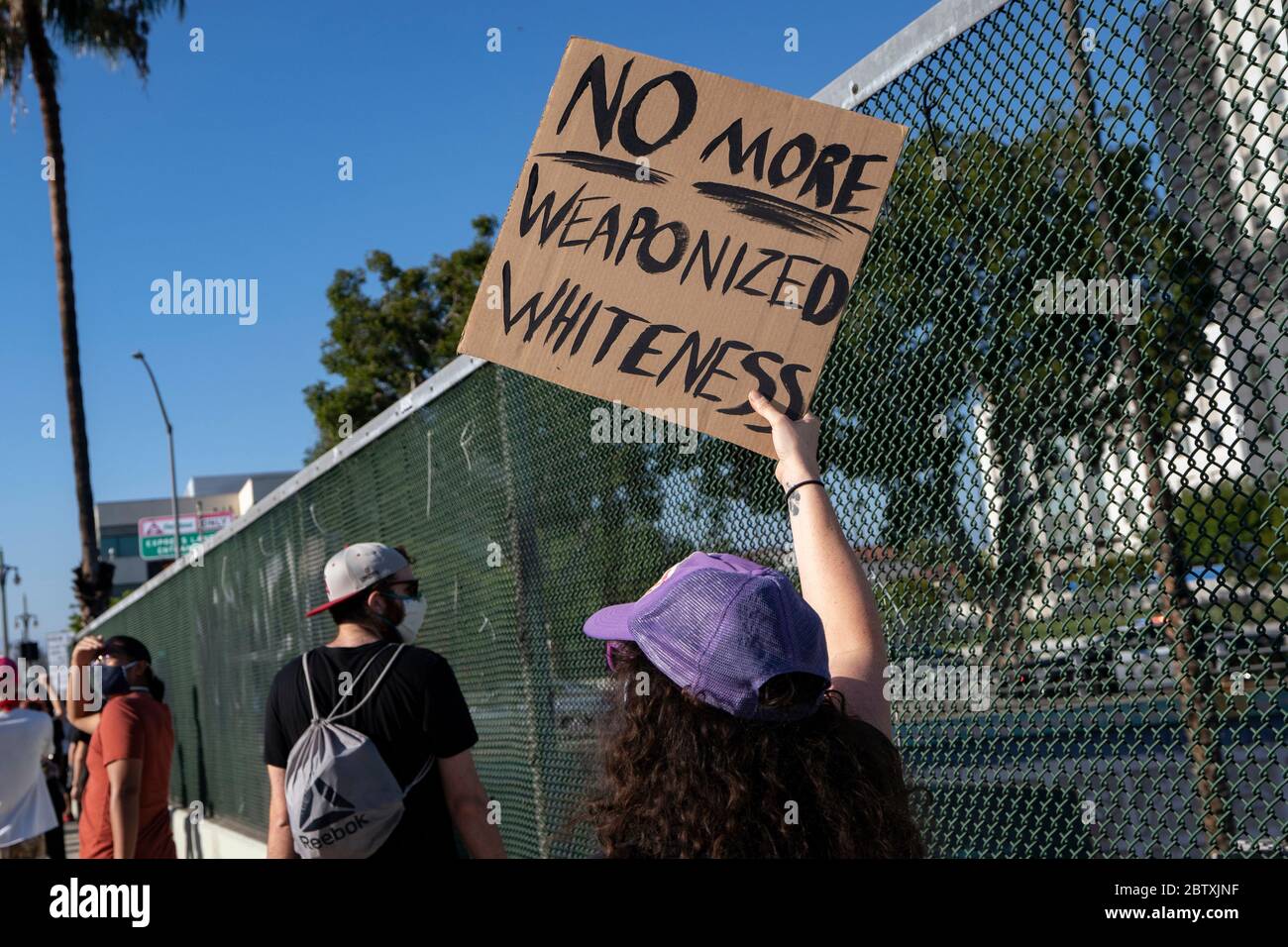 Demonstrators participating in an anti-police brutality protest ...