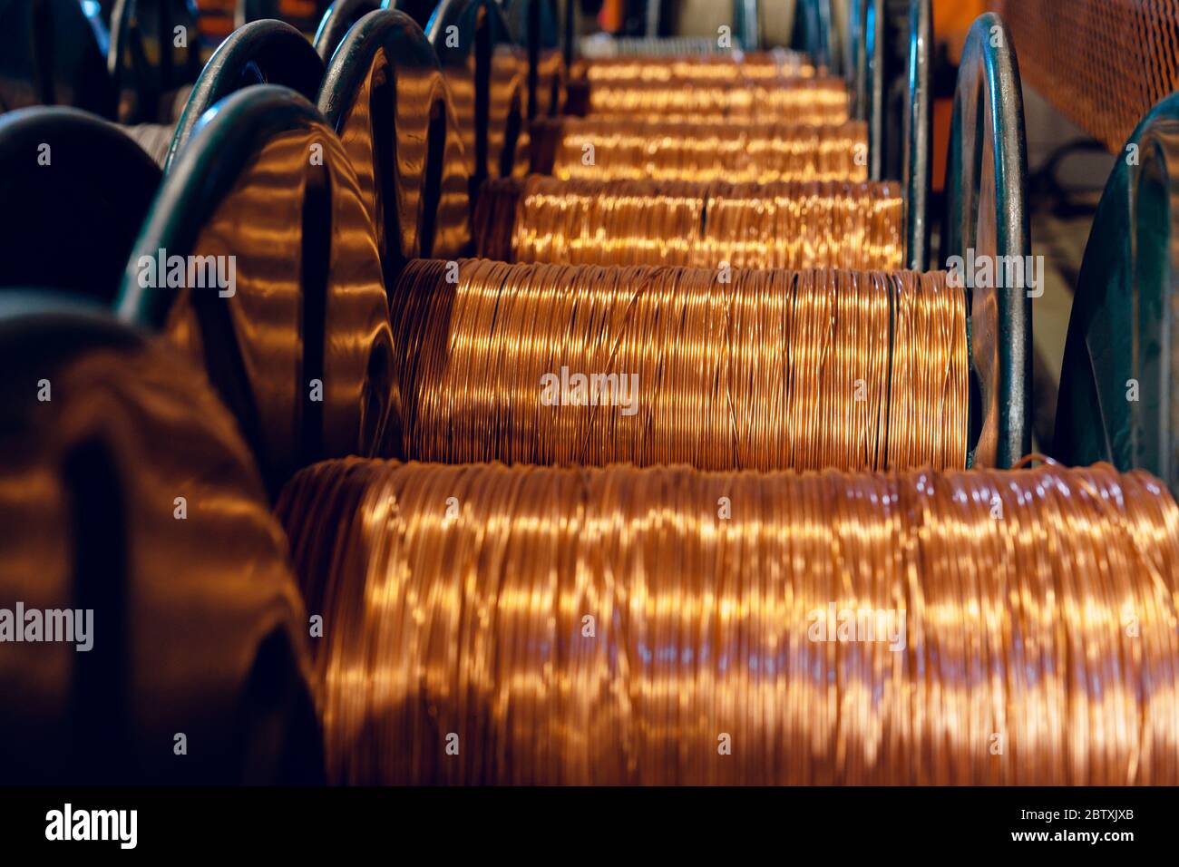 Production of copper wire, bronze cable in reels at factory Stock