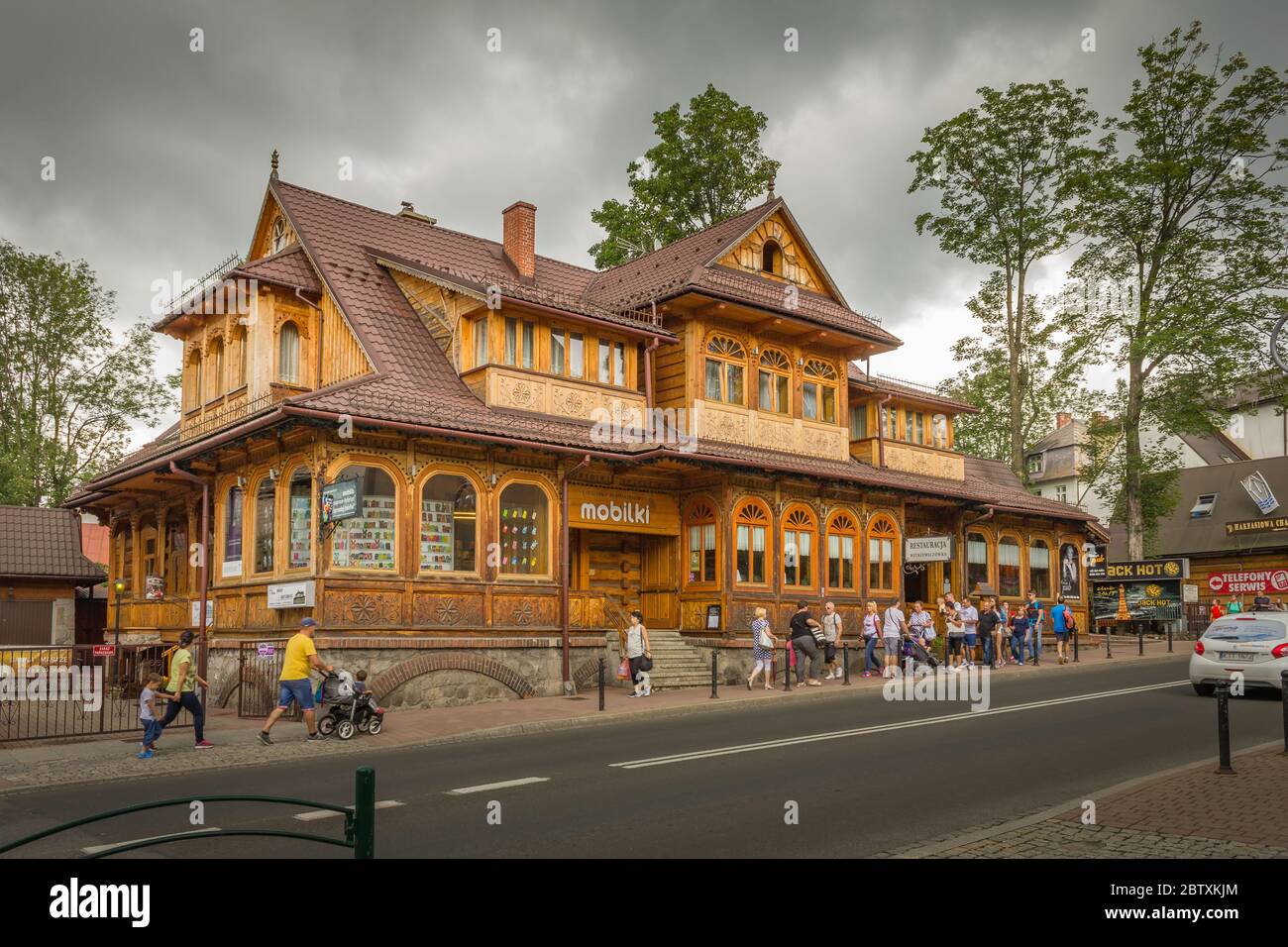 Wooden tenement house. Poland, Zakopane, Krupówki 27.07.2016 Stock Photo