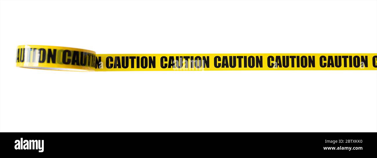 CAUTION yellow tape, adhesive tape isolated on white background Stock Photo