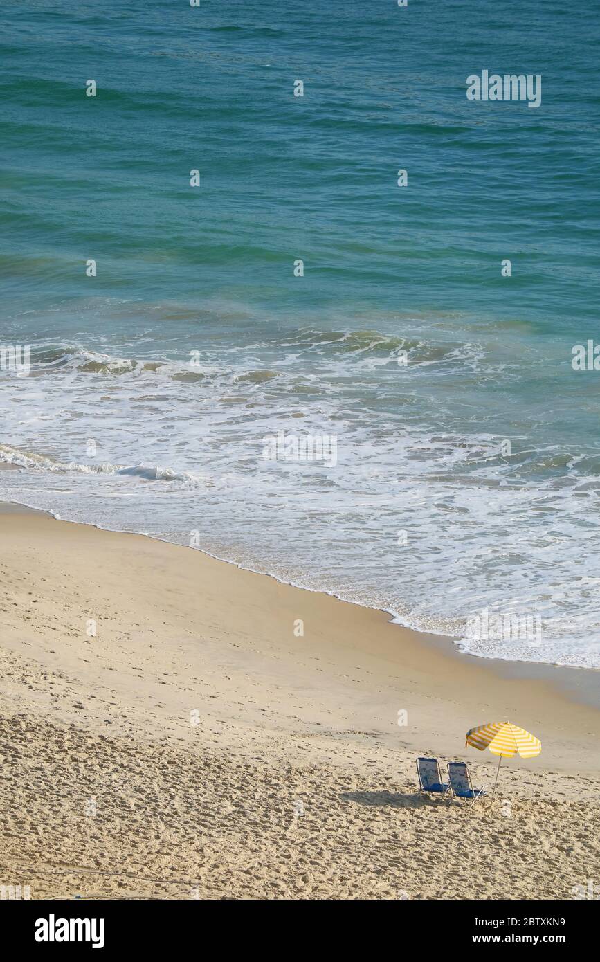 Empty sand beach ocean waves hi-res stock photography and images - Alamy