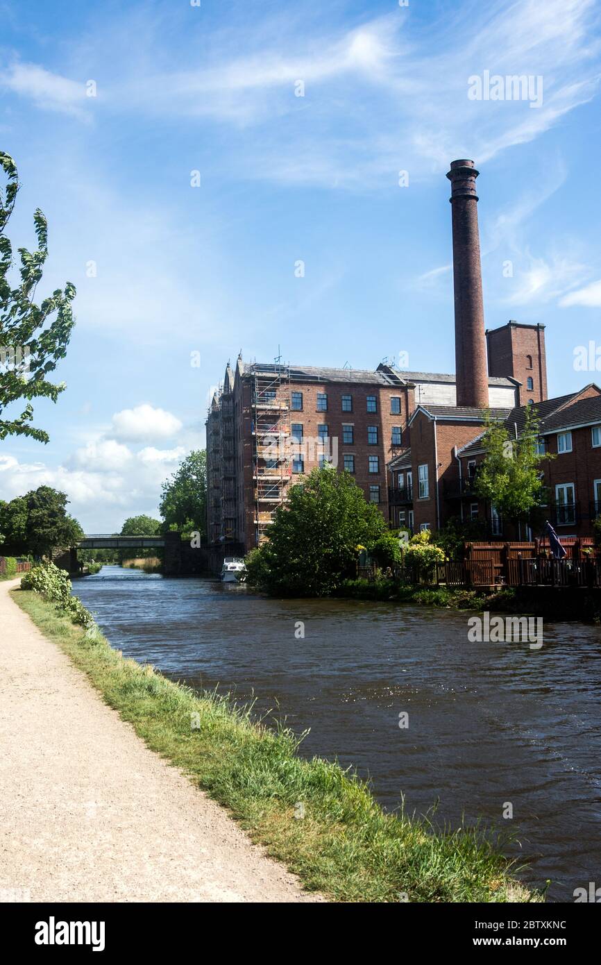 A former factory now converted into canalside apartments Stock Photo ... - Campbell Gray Converted Factory Flats