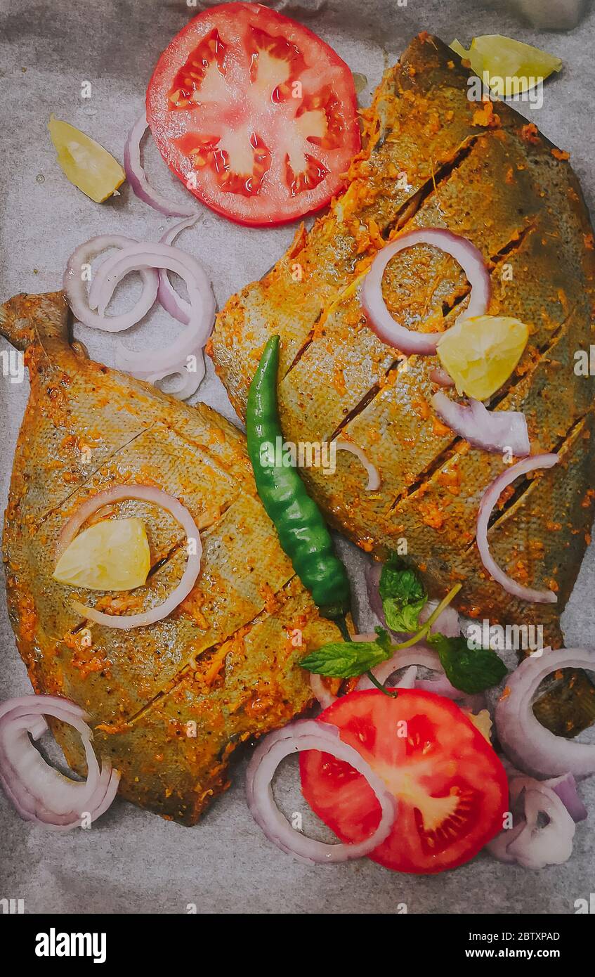 Black Pomfret with indian masala ready grill Stock Photo Alamy