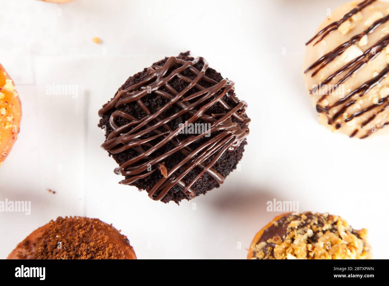 Chocolate Cake Donut with sugary frosting Stock Photo