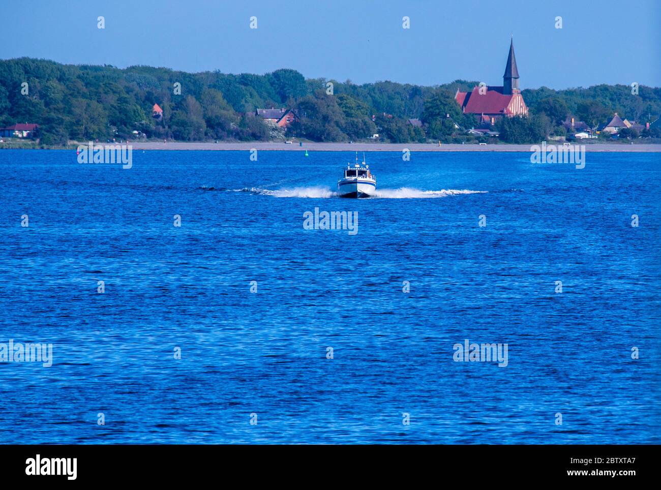 Vitte, Germany. 25th May, 2020. A water taxi takes holidaymakers across the Baltic Sea from the island of Rügen to Hiddensee. Credit: Jens Büttner/dpa-Zentralbild/ZB/dpa/Alamy Live News Stock Photo