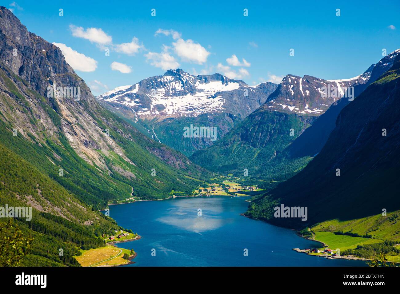 On top of the summit of Mount Saksa with incredible views of the Sunnmore  Alps in Norway Stock Photo - Alamy
