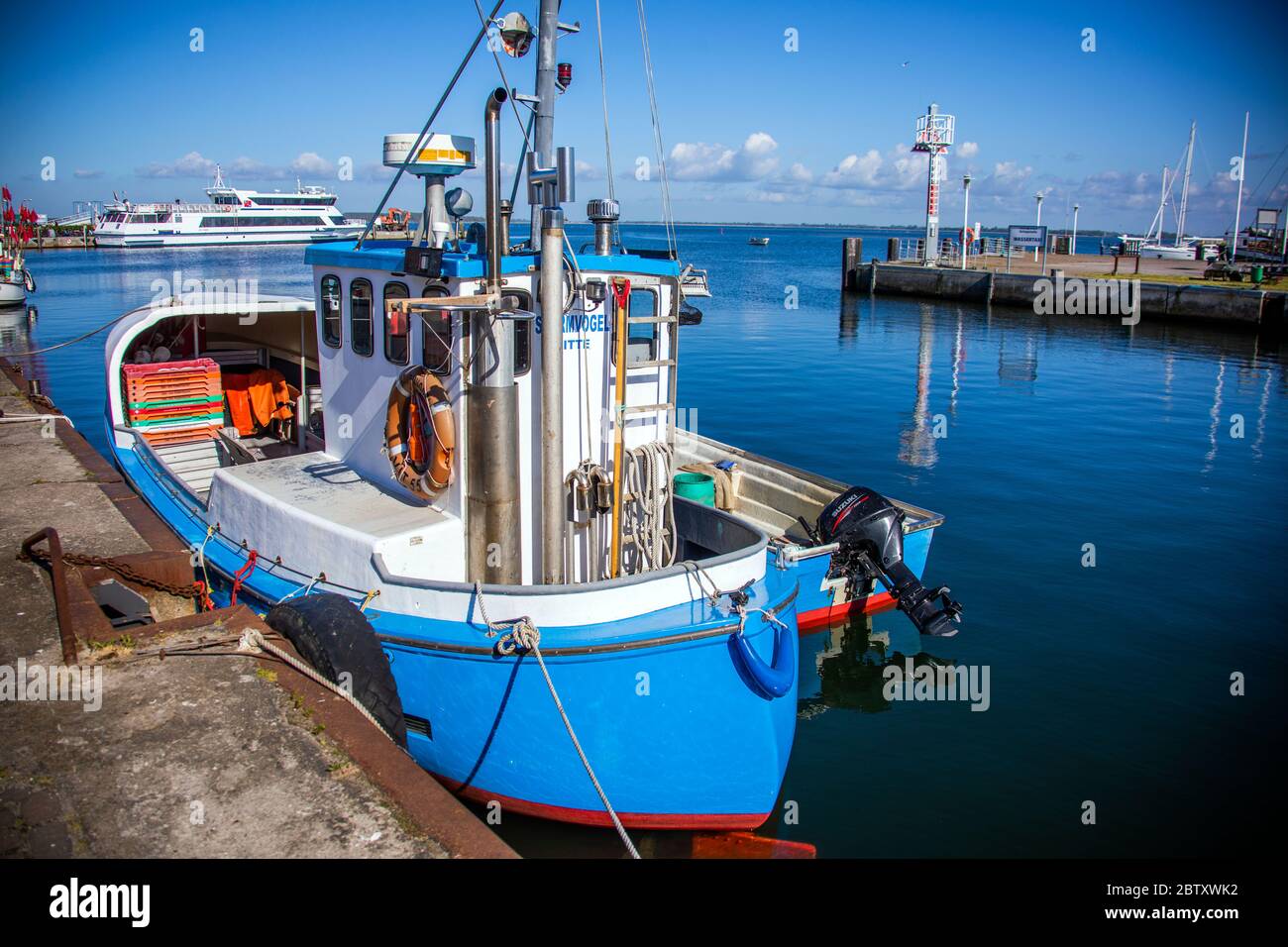 Vitte, Germany. 25th May, 2020. Fishing cutter in the harbour on the Baltic Sea island of Hiddensee. Credit: Jens Büttner/dpa-Zentralbild/ZB/dpa/Alamy Live News Stock Photo