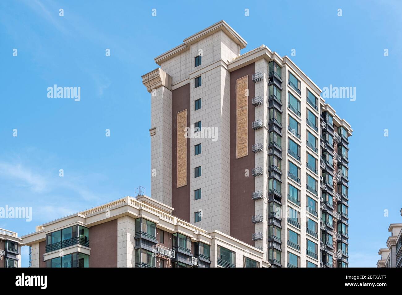 Residential area under blue sky and white clouds Stock Photo - Alamy
