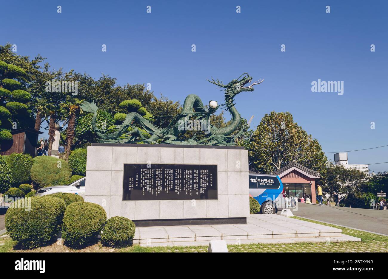 Busan, South Korea, September 14, 2019: sculpture of dragon and its pearl in Yongdusan park on sunny day Stock Photo