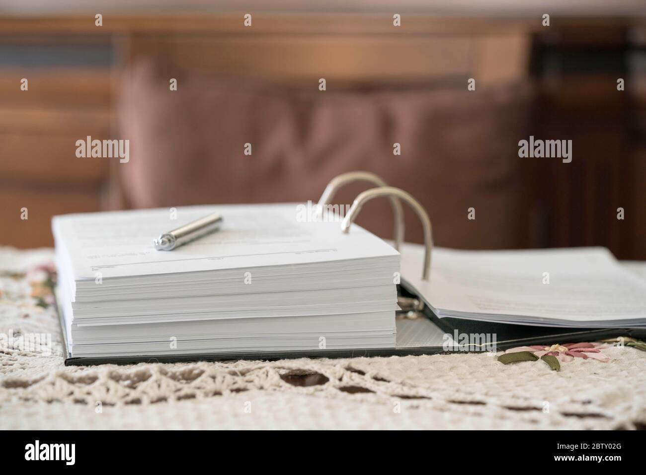 an opened book on a table, indoor with copy space Stock Photo